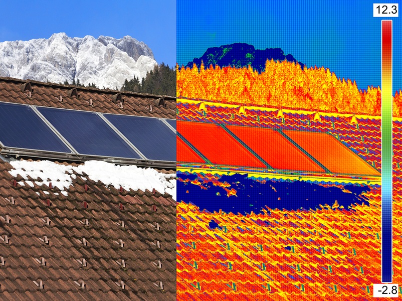 Infrared and real image of Photovoltaic Solar Panels on the roof House